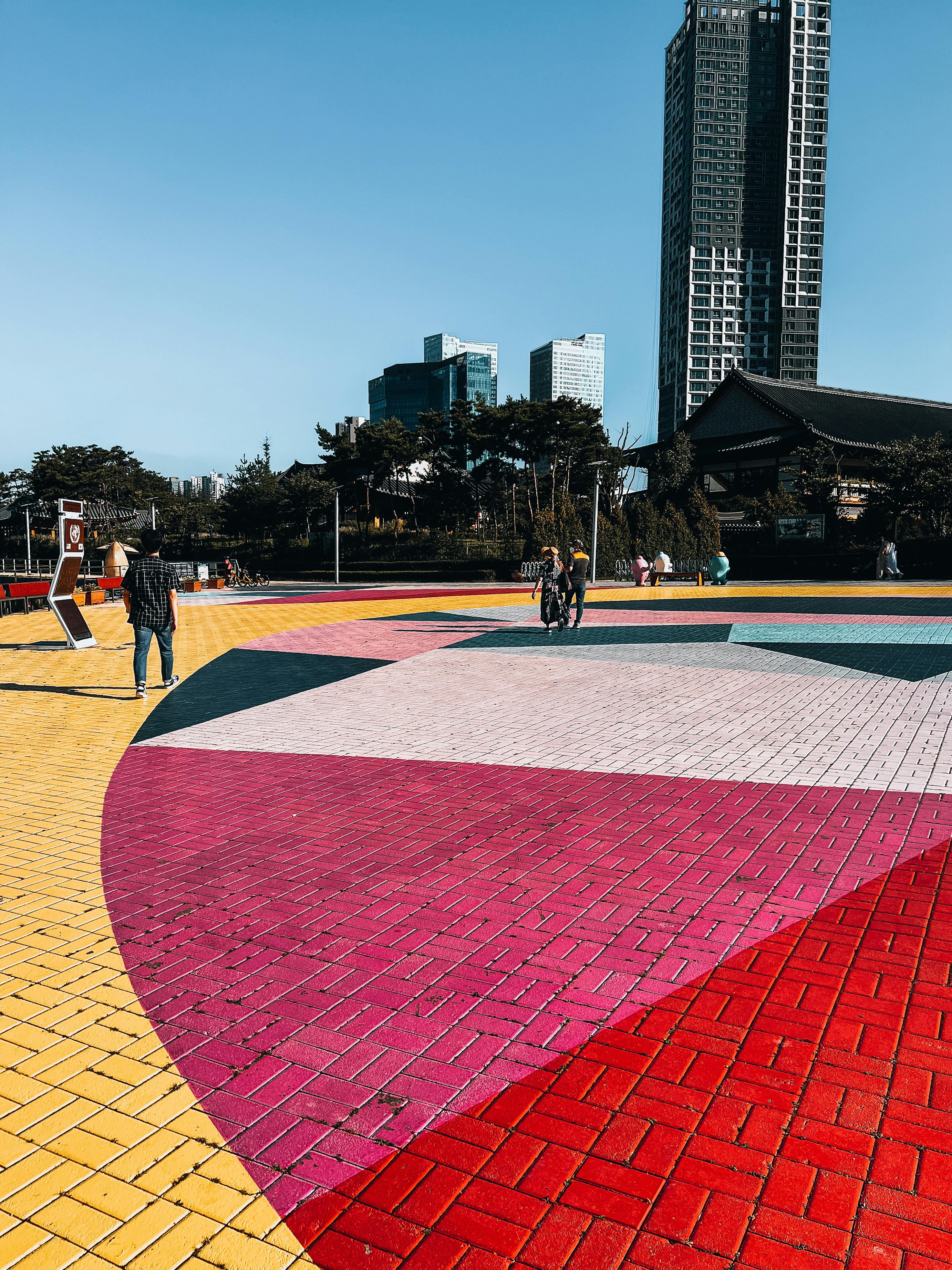 Colorful Bricks Pavement Near Building · Free Stock Photo