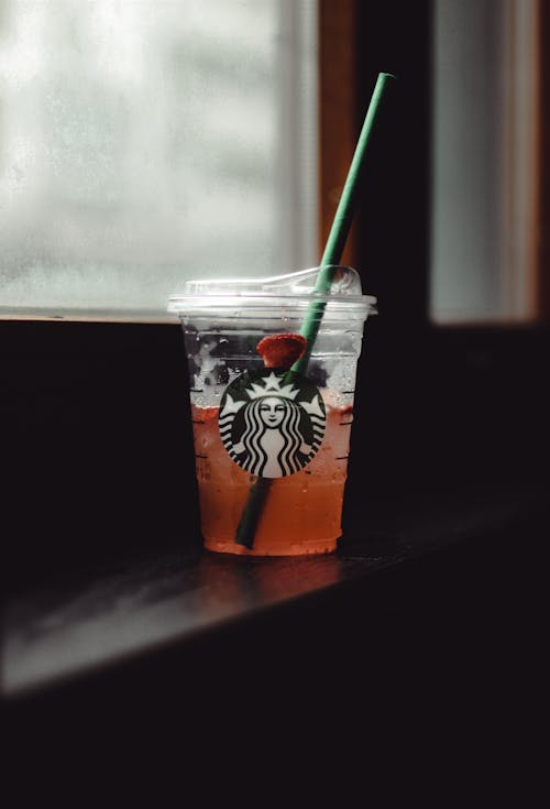 Strawberry Drink on Clear Cup with Plastic Straw