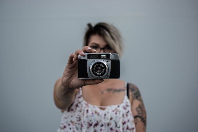 Person Holding Camera