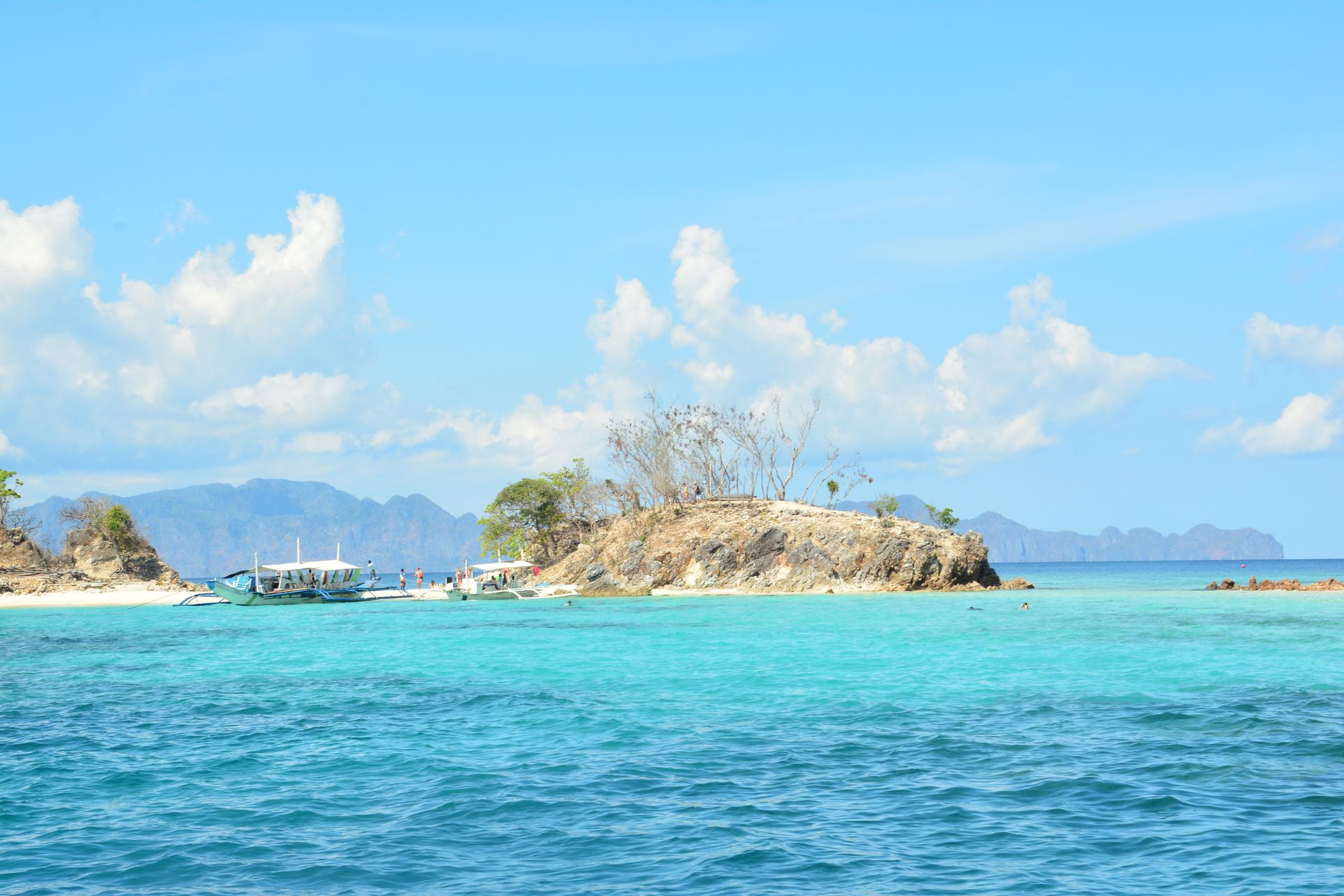 Discover the serene beauty of Bulog Dos Island, a tropical paradise in Coron, Philippines.