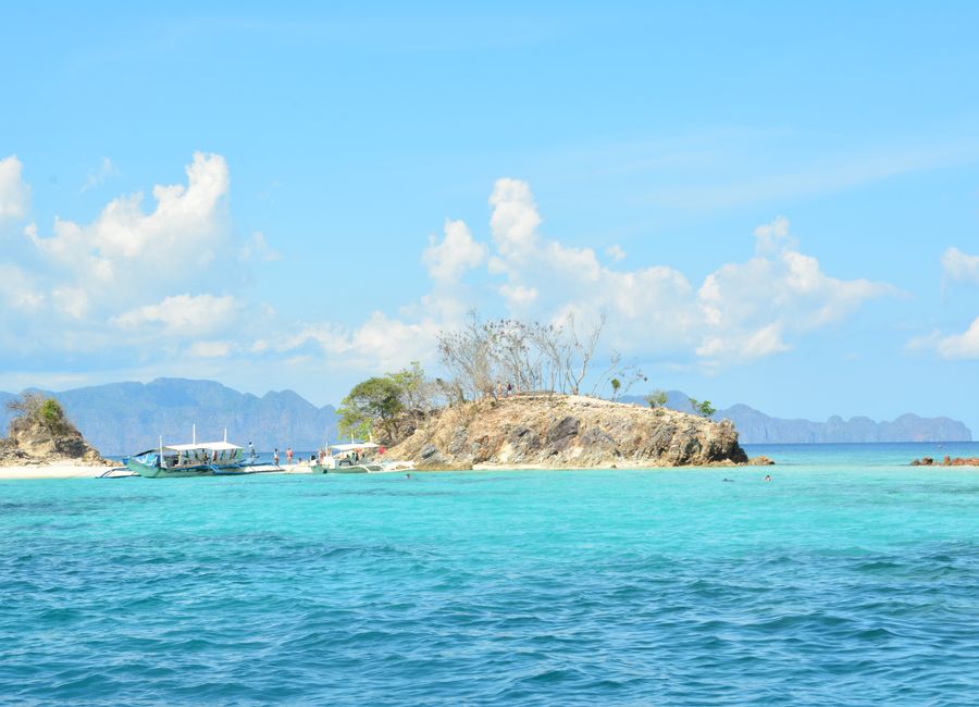 Discover the serene beauty of Bulog Dos Island, a tropical paradise in Coron, Philippines.
