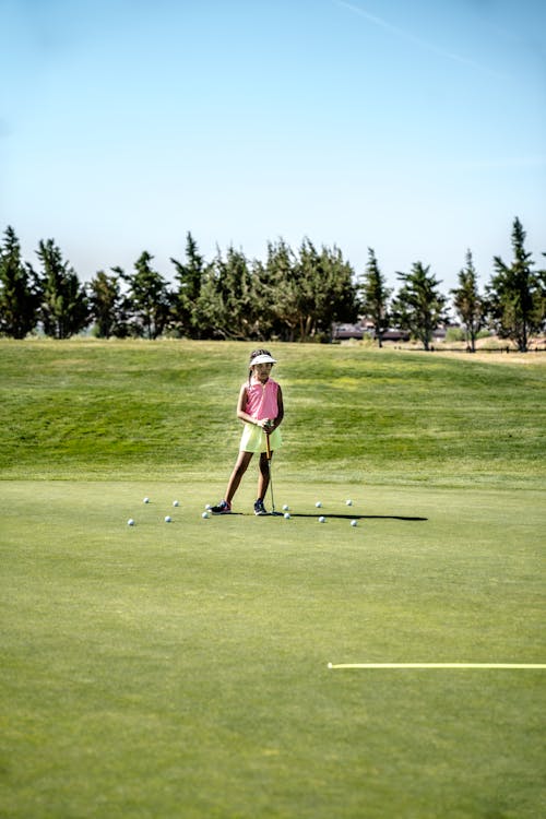 Girl Holding Golf Club