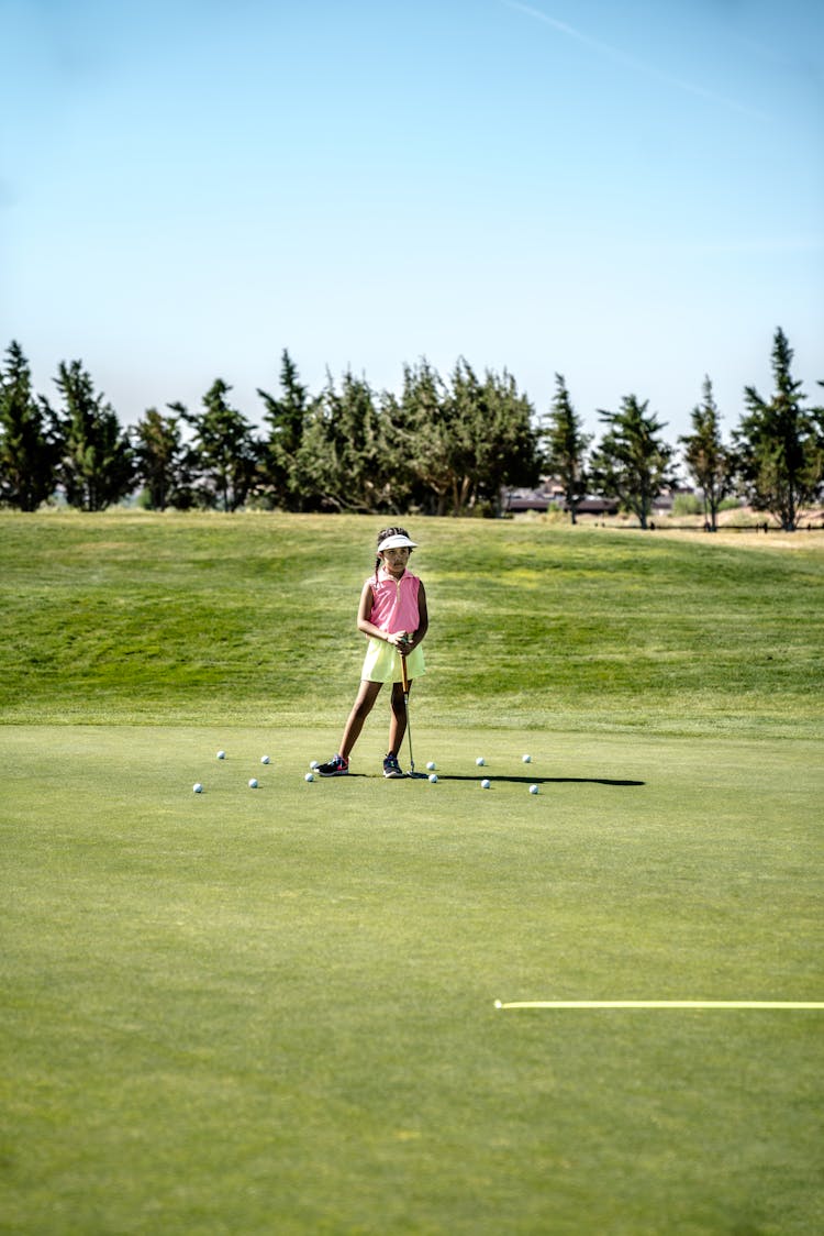 Girl Holding Golf Club