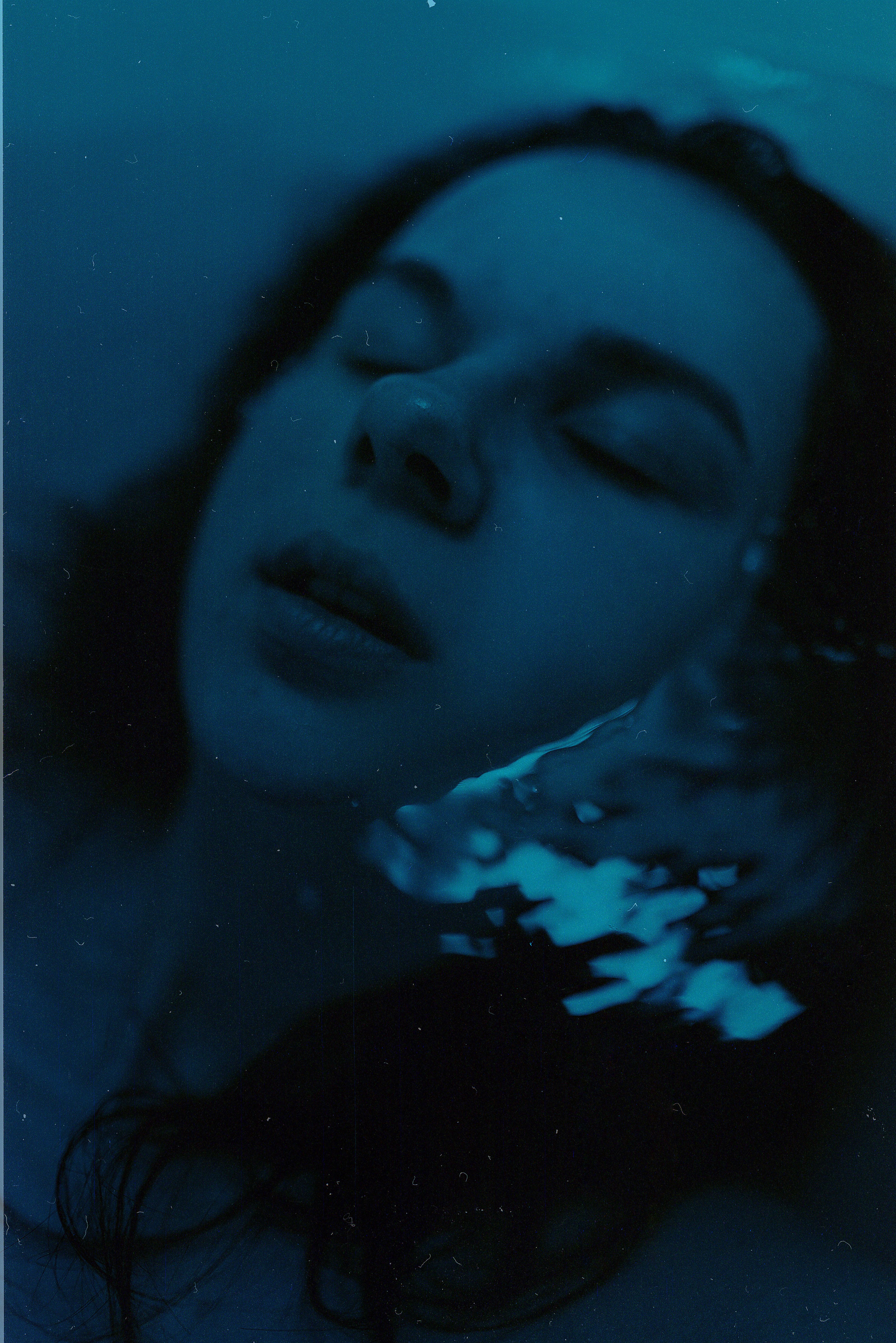 Close-up of Woman Lying in Water · Free Stock Photo