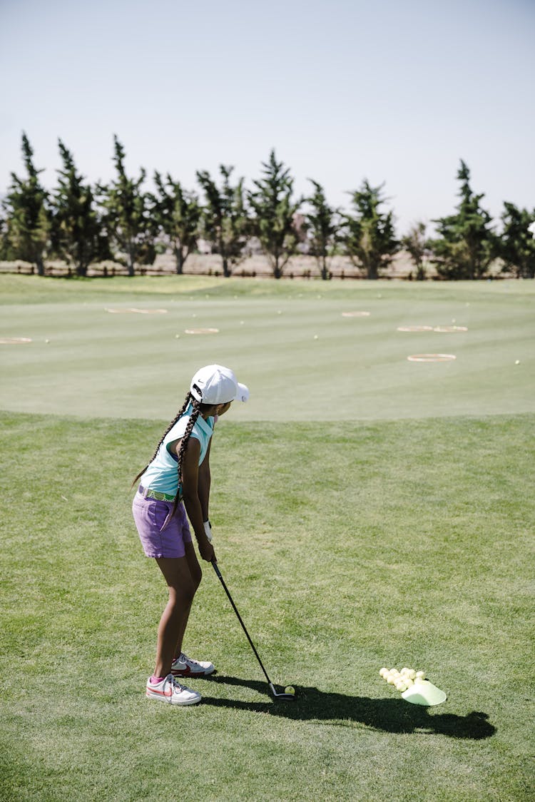 Girl Playing Golf