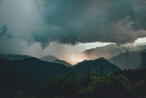 Aerial View of Gray Clouds over a Mountain Range · Free Stock Photo