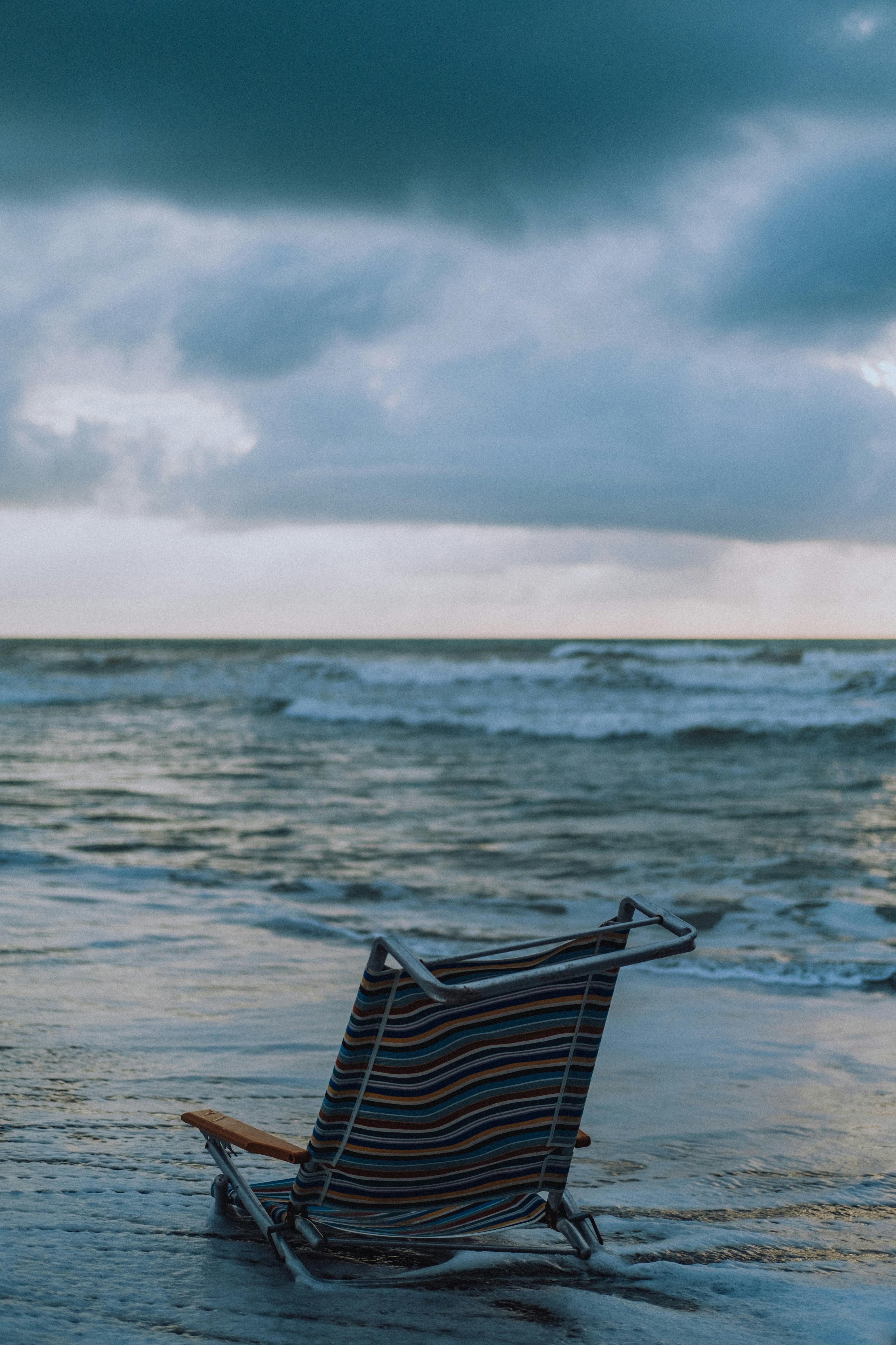 Red Folding Chair on Beach · Free Stock Photo