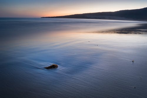 無料 日没時の水域 写真素材