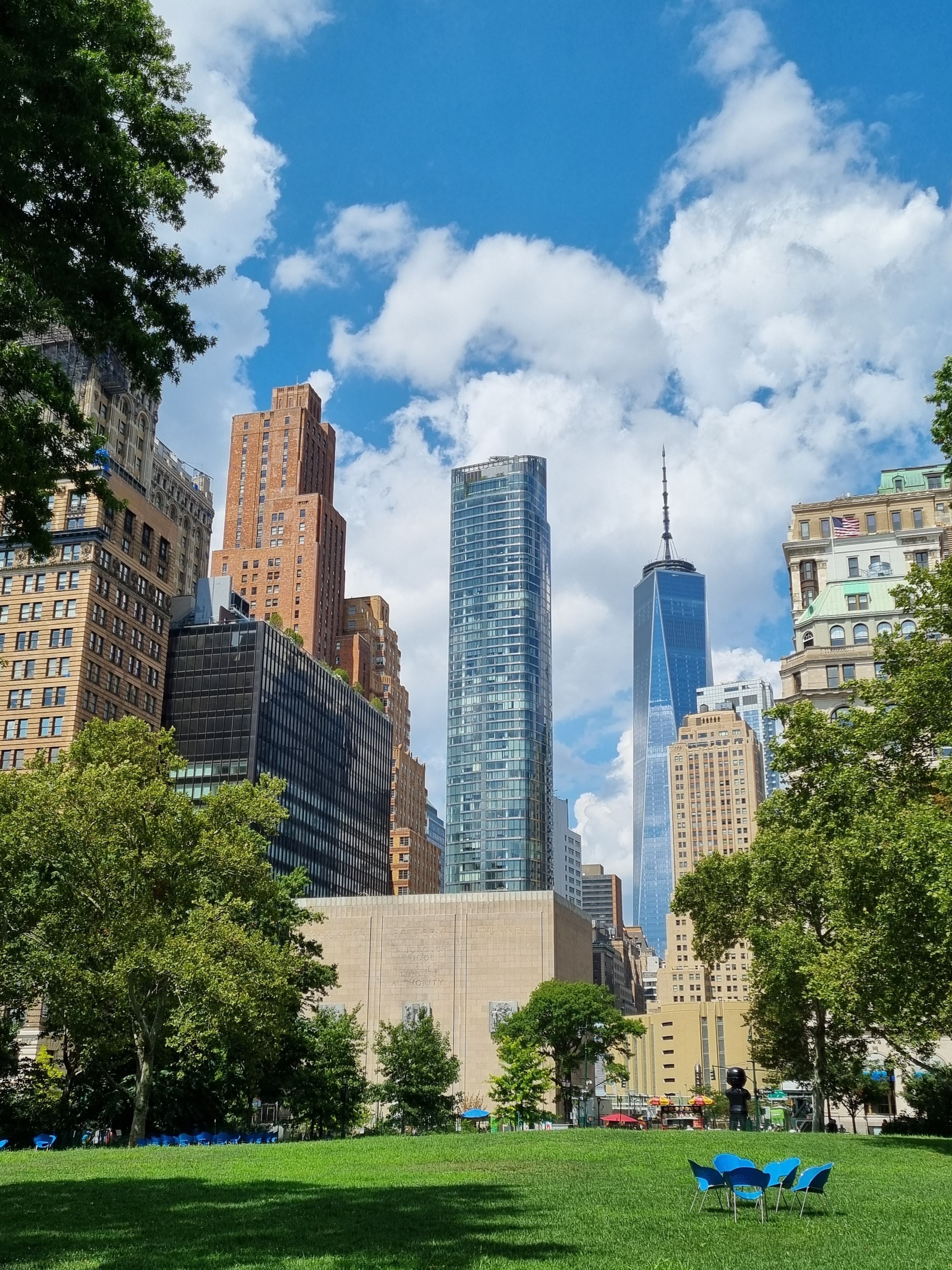 City Buildings Under Blue Sky and White Clouds · Free Stock Photo