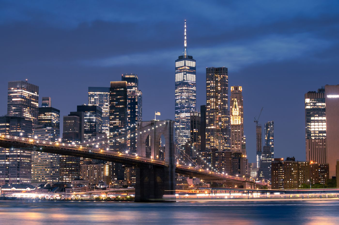 Brooklyn Bridge and the Manhattan skyline at dusk