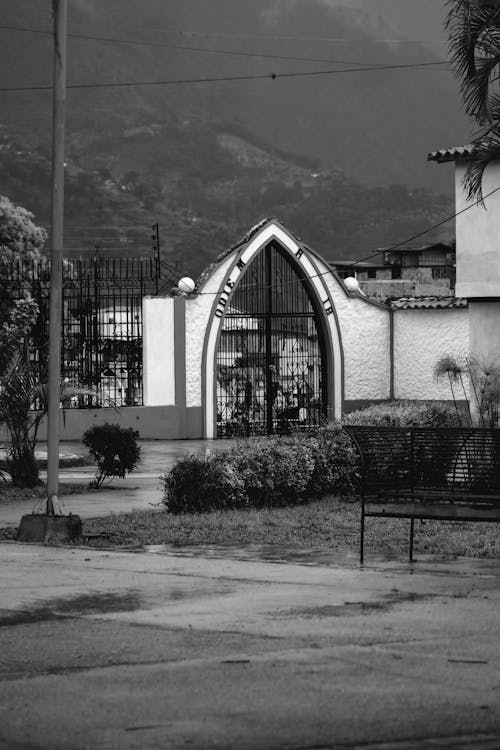 Grayscale Photo of Concrete Building