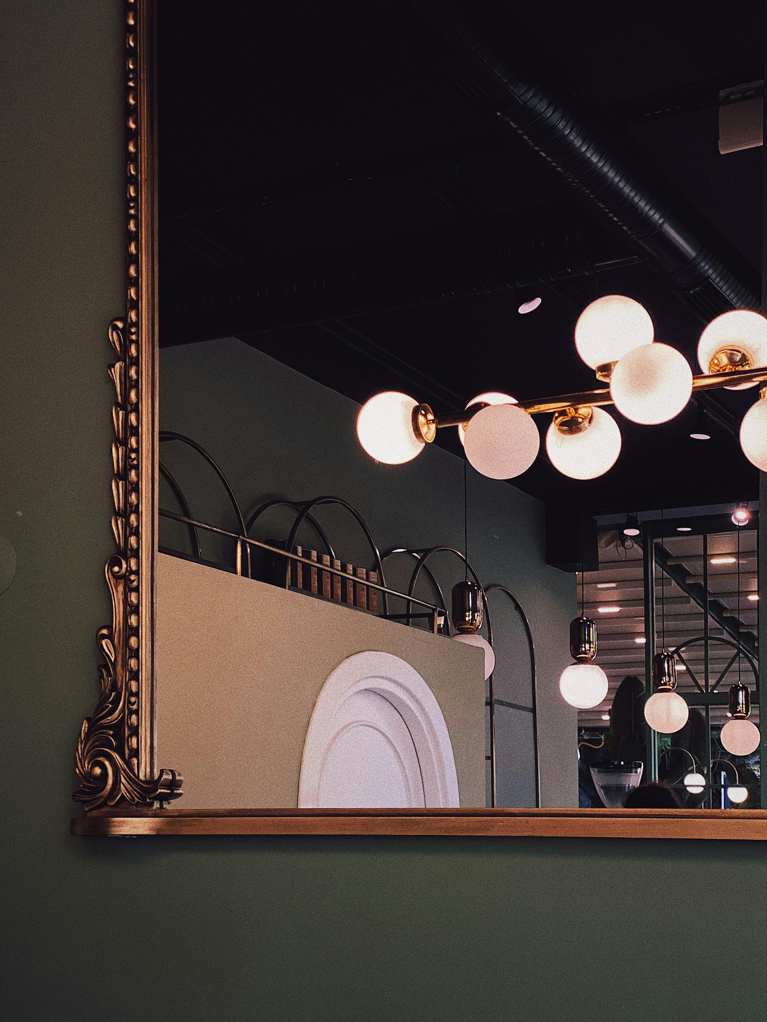 Mirror Reflecting Glowing Light Fixtures · Free Stock Photo