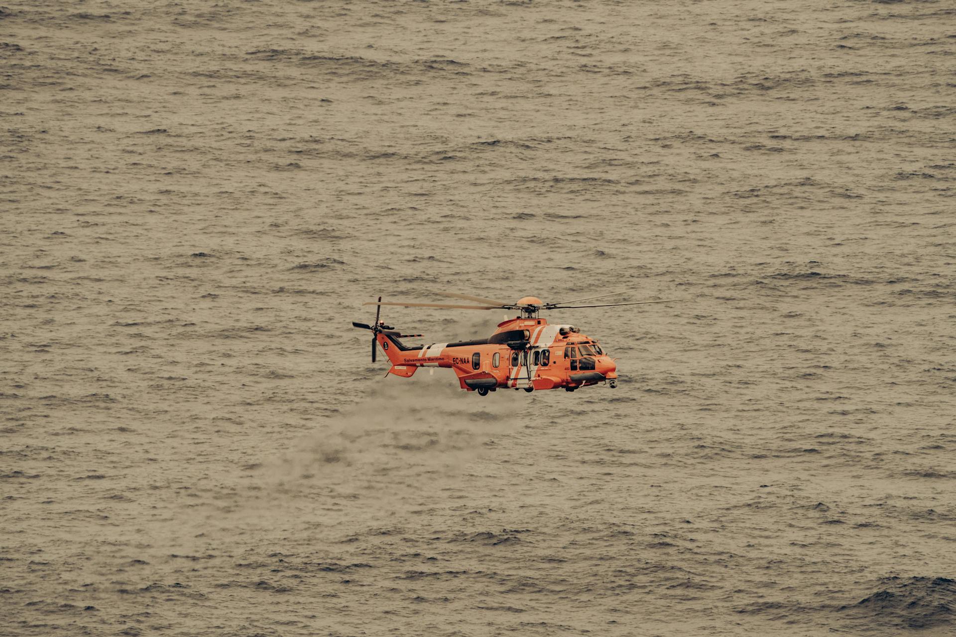 A Spanish Maritime Safety Agency EC225 Flying over Water