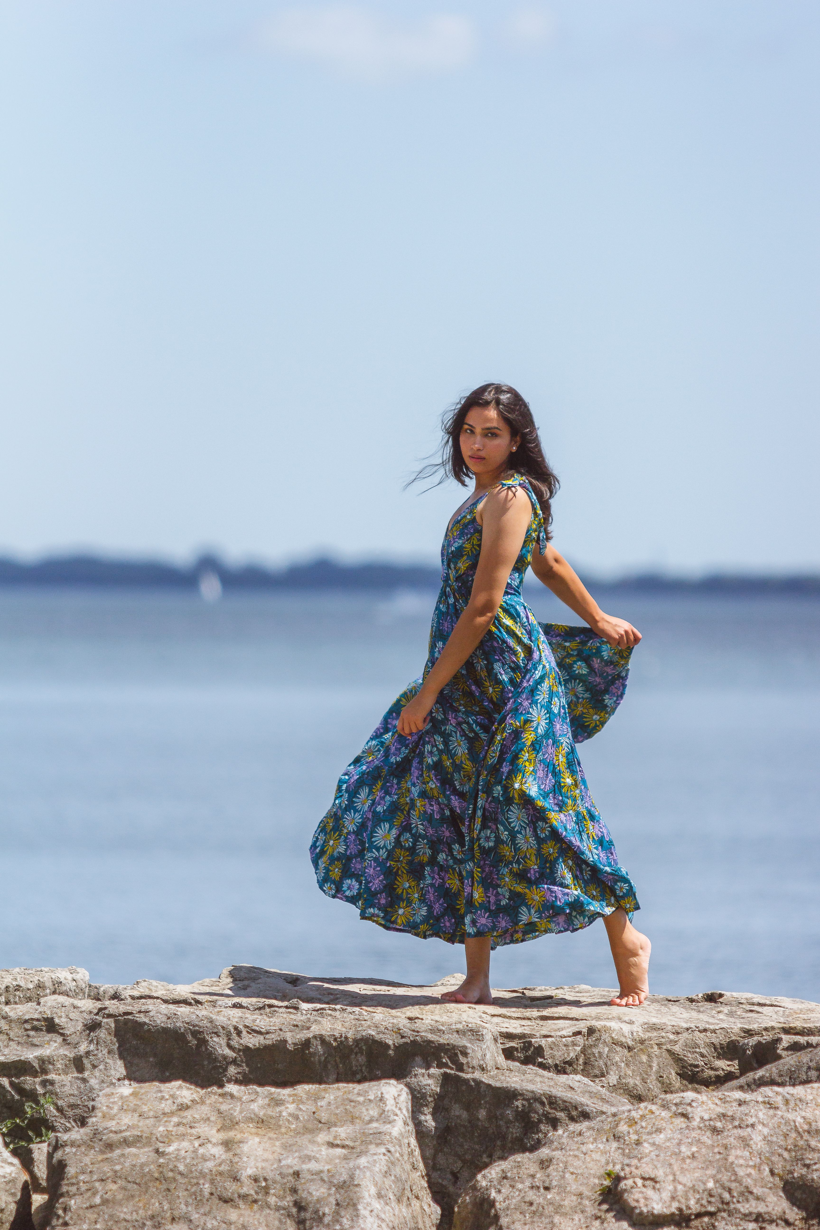 Woman in Floral Dress Standing on the Rock · Free Stock Photo