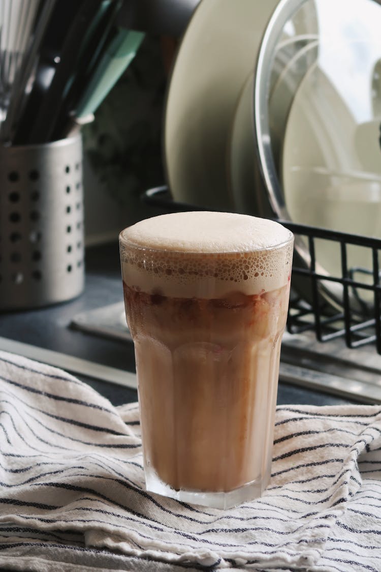 Close-Up Photo Of An Iced Caramel Mocha On Clear Glass