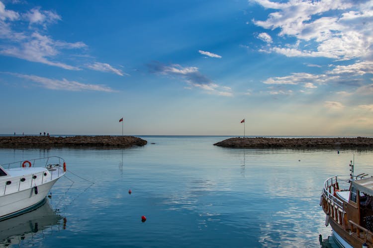 Yachts Docked Near Breakwater Photo