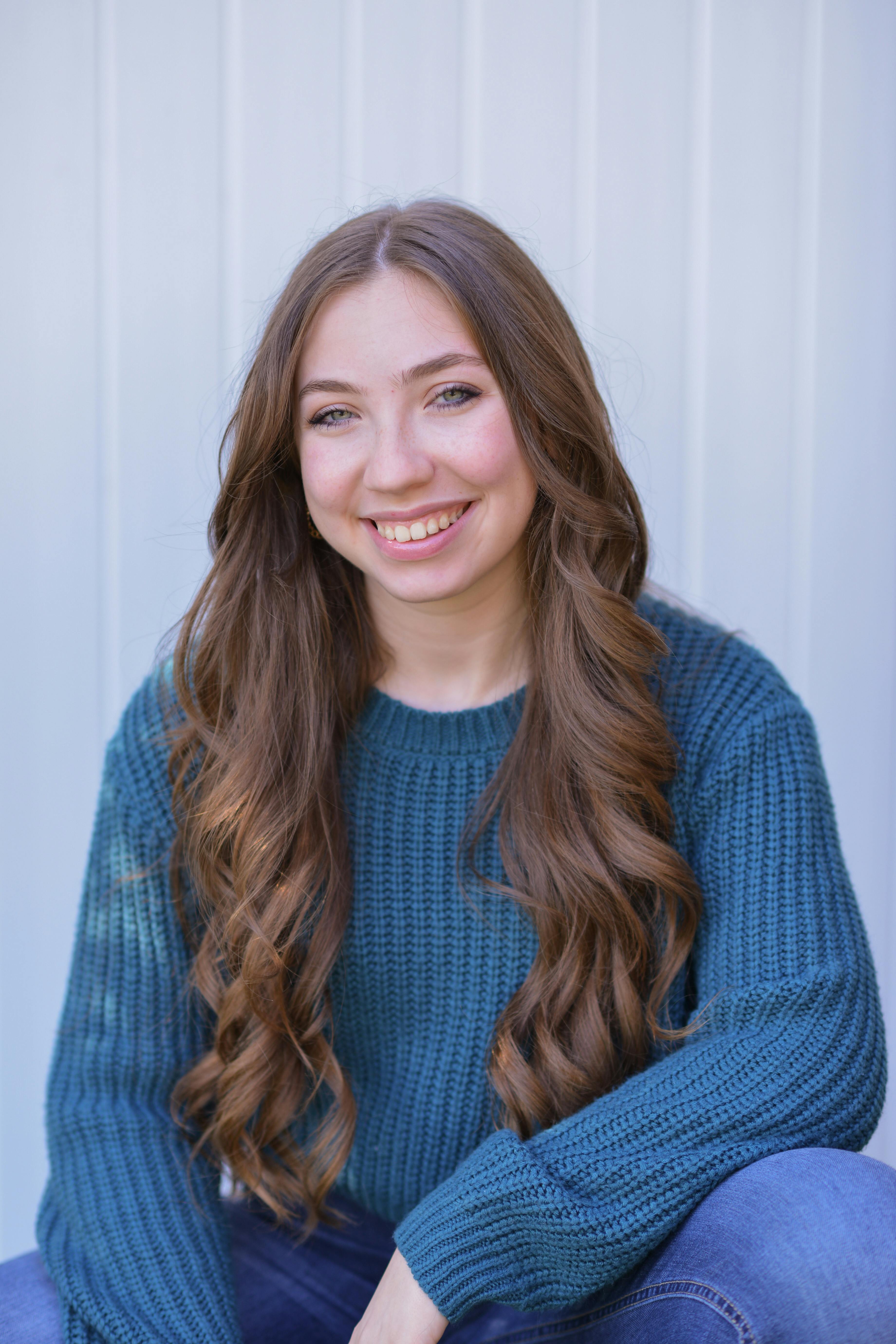 A Woman with Ponytail Hairstyle · Free Stock Photo