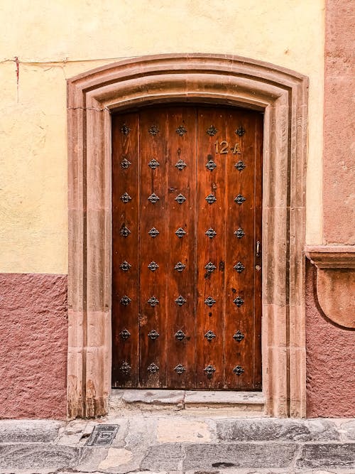 Brown Wooden Door of a Building