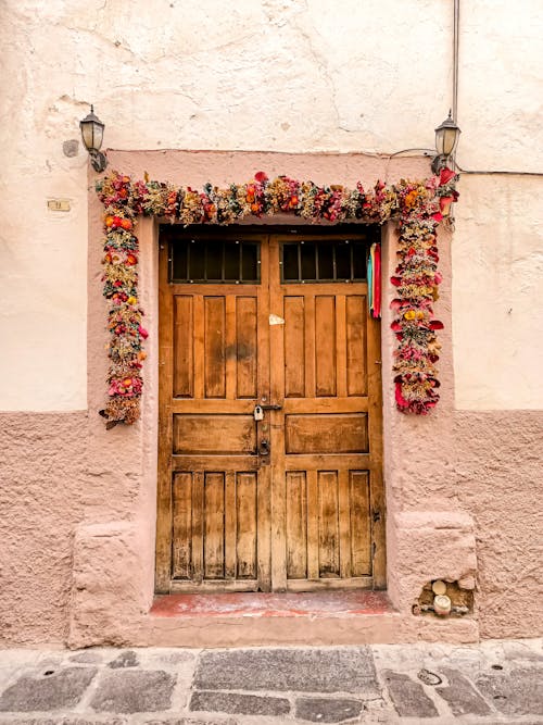 Flower Arch above a Wooden Door