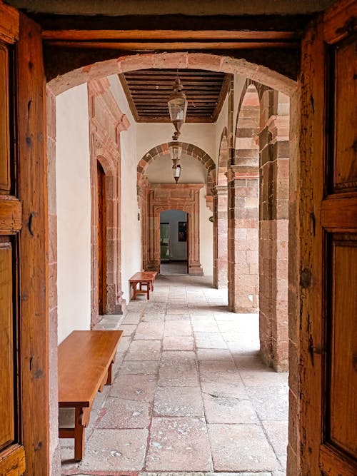 Wooden Benches on a Hallway