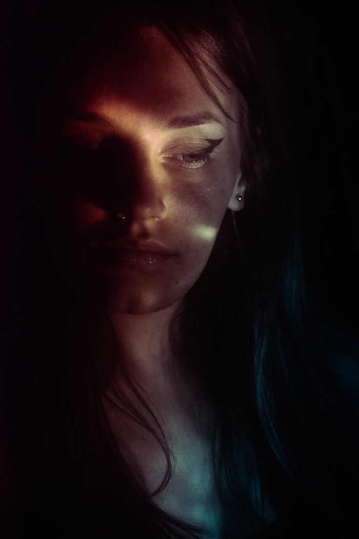 Low-key portrait in dramatic light — Diana on Pexels