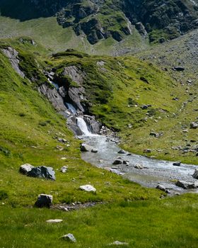 Green Grass Field and Mountain