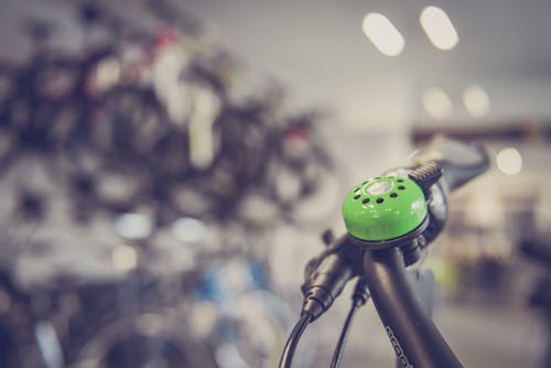 Free Tilt Shift Lens Photography Green Bicycle Bell Switch Stock Photo