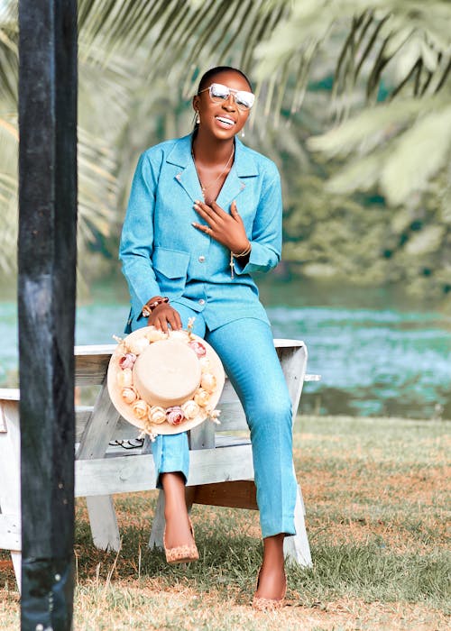 A Woman in Blue Suit and Blue pants