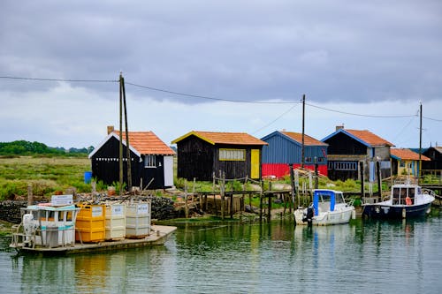 Wooden Houses on the Side of the River