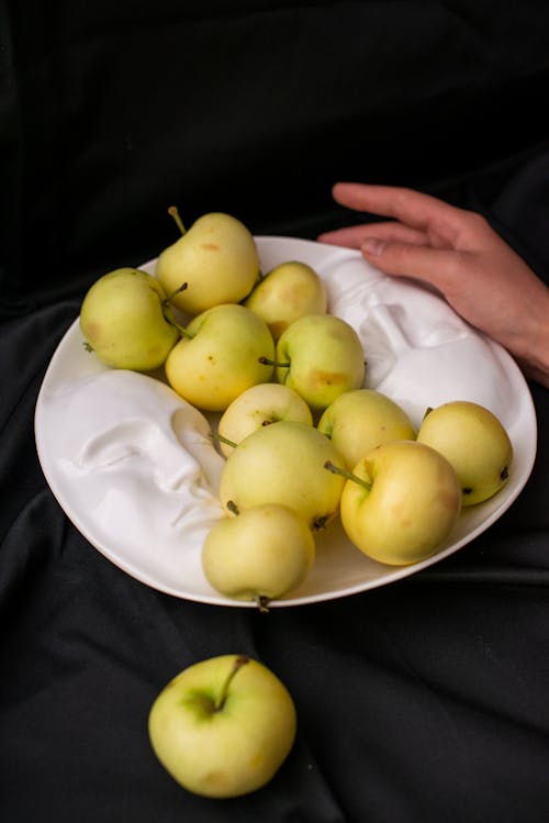 Free Yellow Round Fruits on White Ceramic Plate Stock Photo