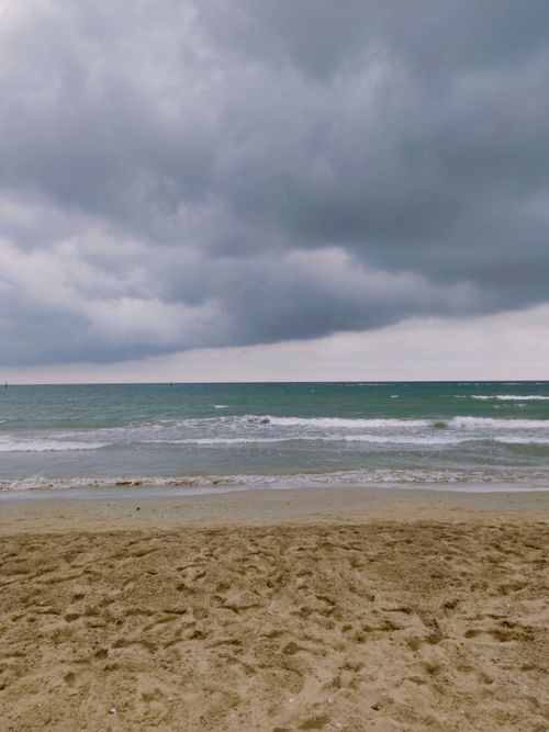 Free Moody seaside view with clouds and waves at Ponte Sasso, Italy. Stock Photo