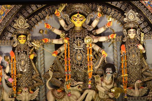 Free A vibrant idol of Goddess Durga with intricate decorations at the Durga Puja festival in India. Stock Photo