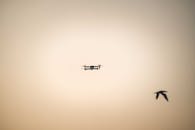 Silhouette of Drone Flying in the Sky