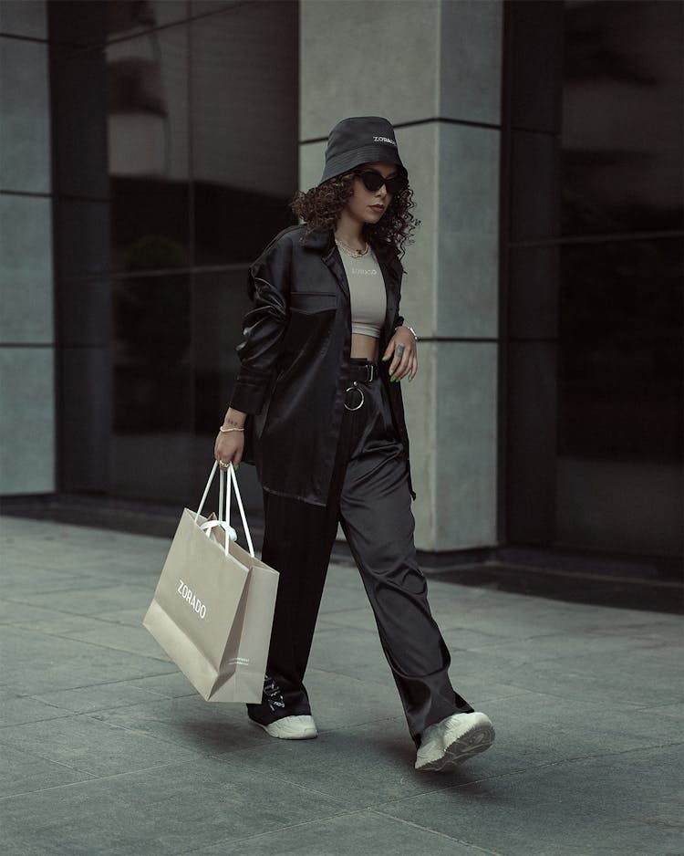 Stylish Woman Walking Street With Shopping Bag