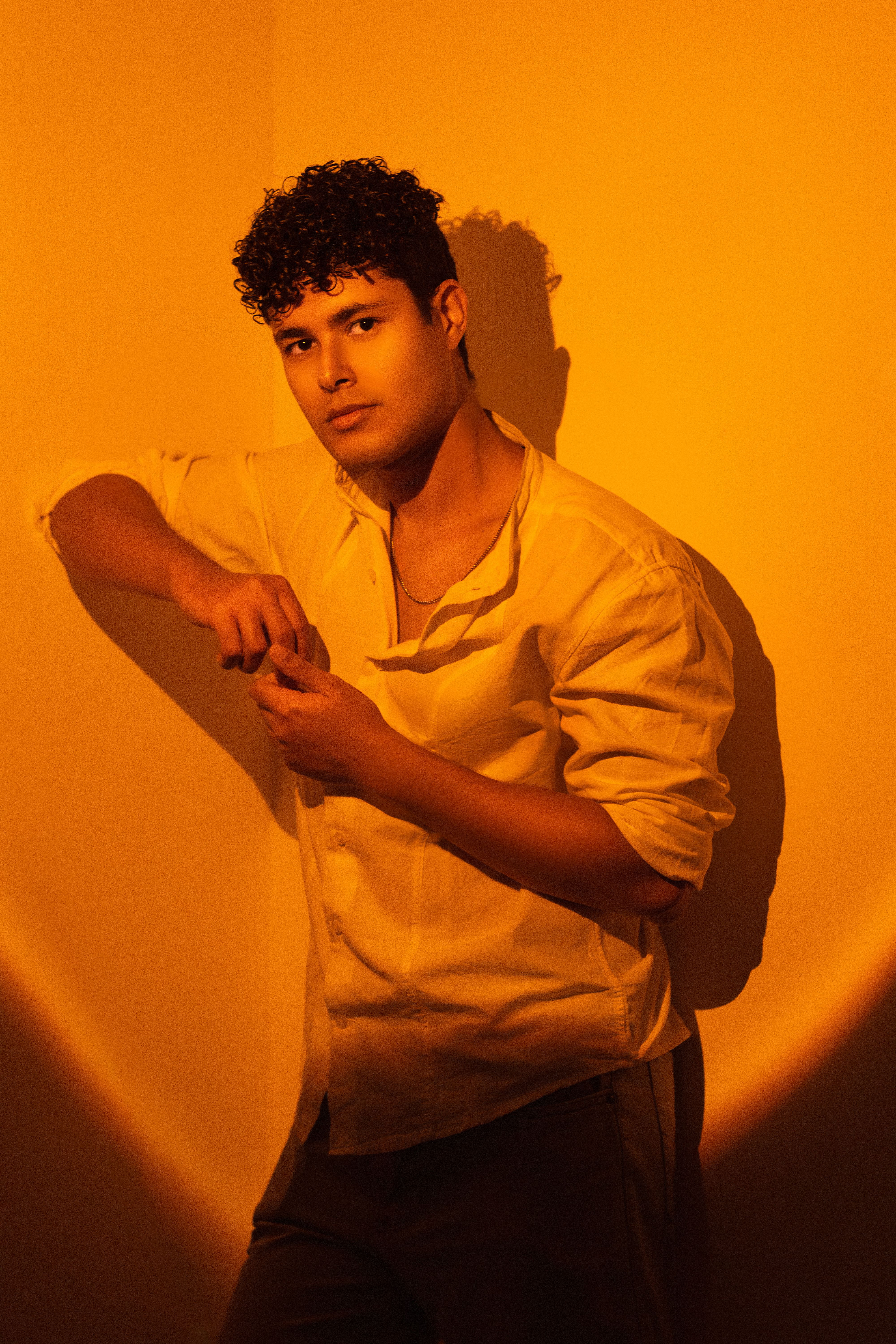 Man Posing in Yellow Light · Free Stock Photo