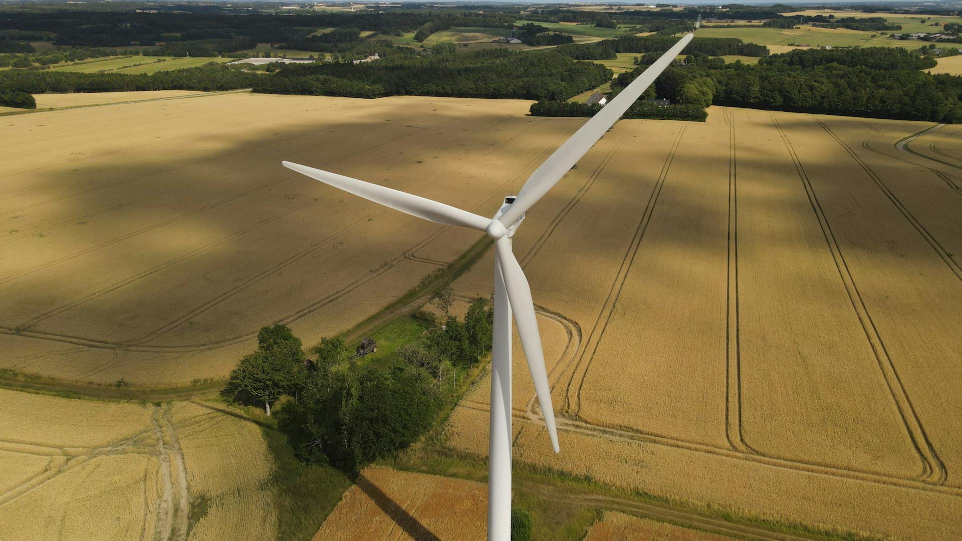 Aerial View of a Wind Turbine on a Cropland