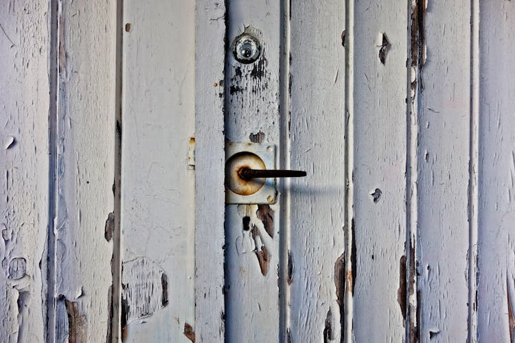 White Wooden Door With Brass Door Lever