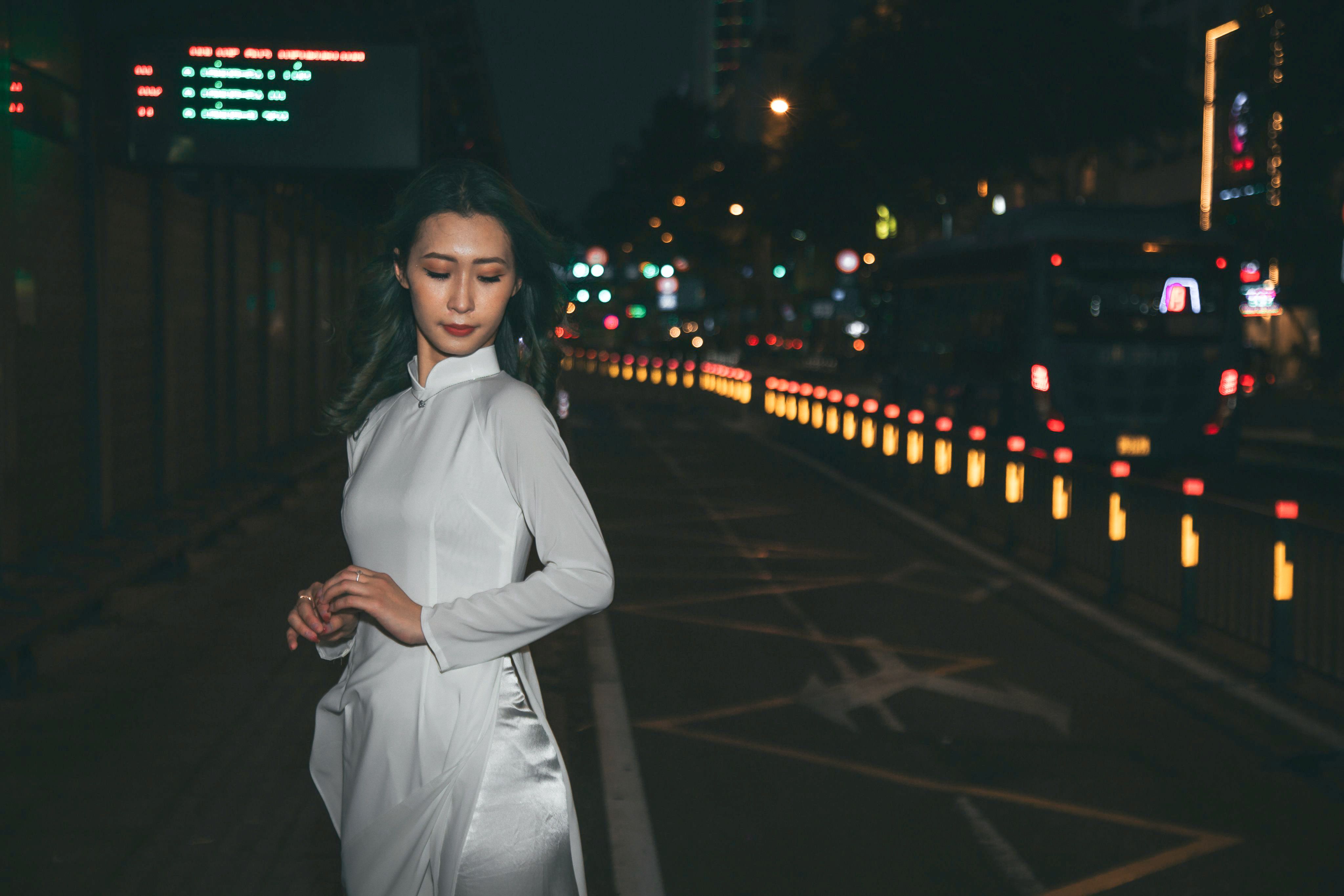 A Woman in White Long Sleeve Dress · Free Stock Photo