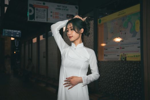 Woman in White Long Sleeve Dress