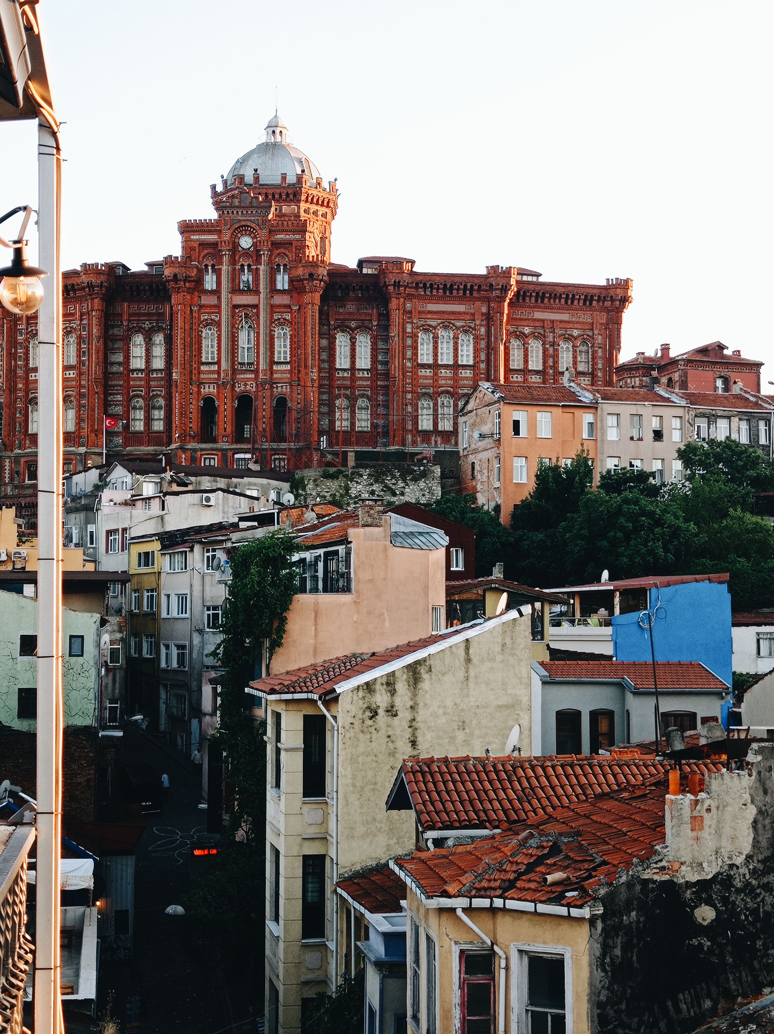 Concrete Buildings Under White Sky · Free Stock Photo