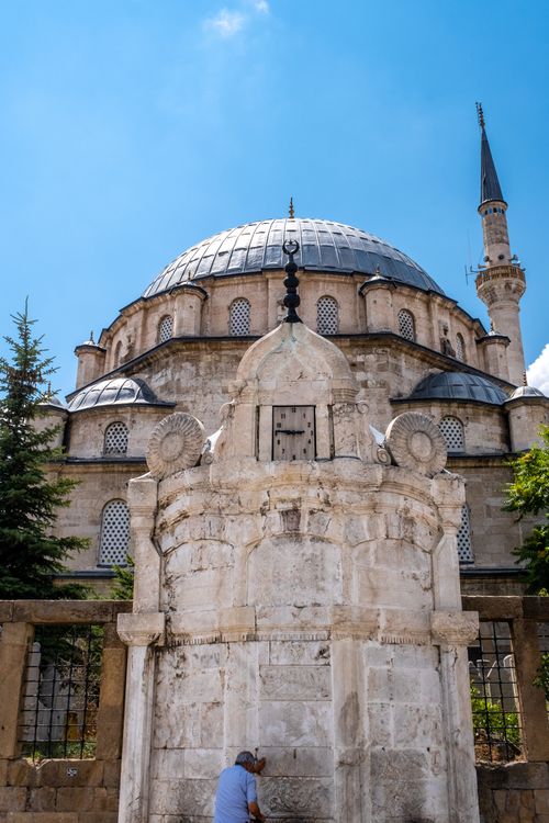 Free Historic Ottoman mosque with a domed roof under a blue sky in Turkey. Stock Photo