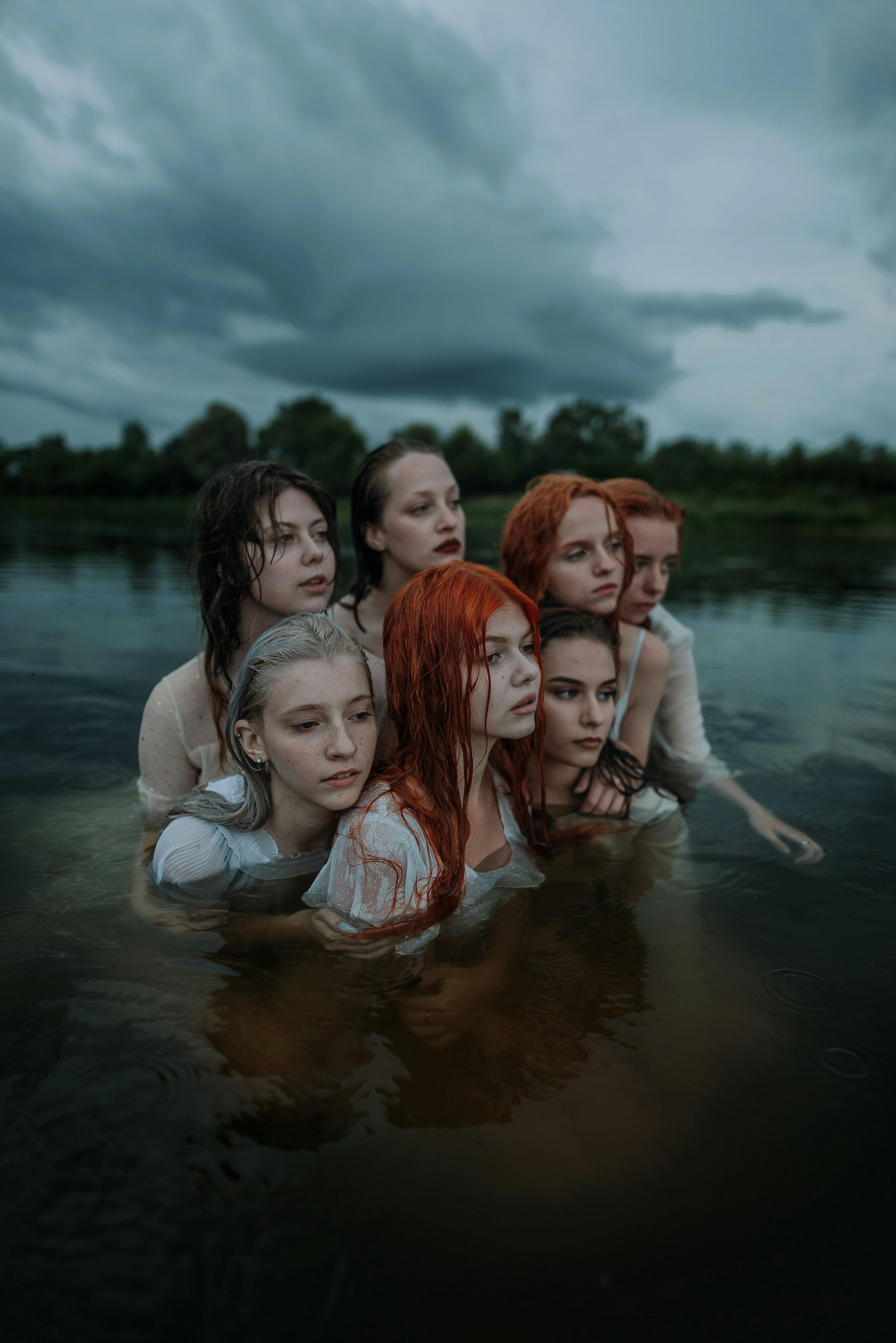 women posing together in water