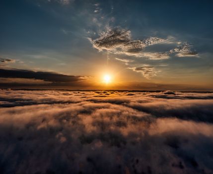 A breathtaking sunset view over a dramatic cloudscape in Weaver, Minnesota, capturing the golden hour light.