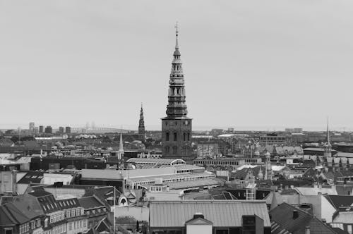 Free Grayscale Photo of the Church of Our Savior Tower in Copenhagen Denmark Stock Photo