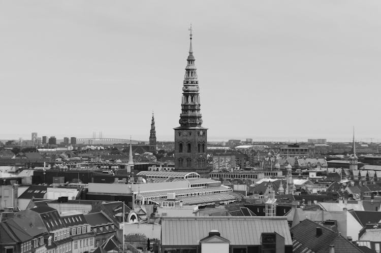 Grayscale Photo Of The Church Of Our Savior Tower In Copenhagen Denmark