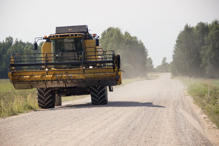 Yellow Truck On Dirt Road