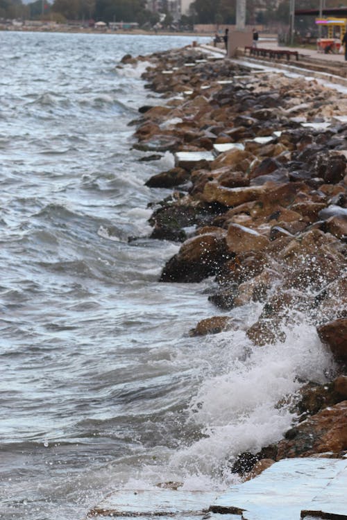 Brown Rocks on Sea Water