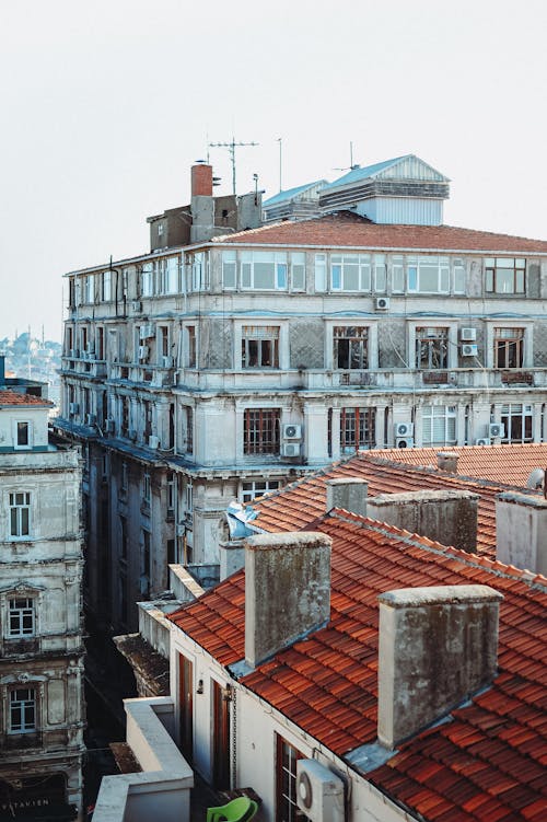 Photo of an Old Building and Houses