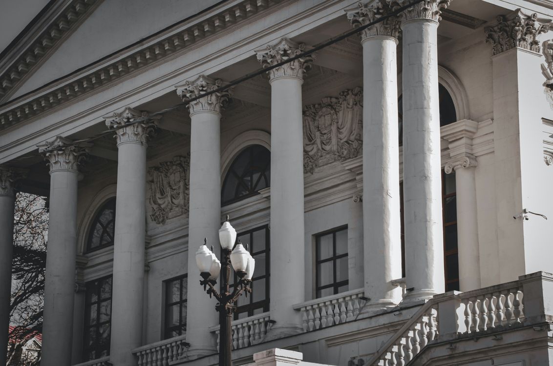 Different Building Colom Photo of a Building with Columns · Free Stock Photo
