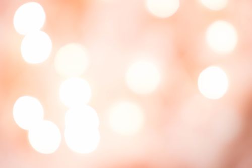 Free Abstract image of soft bokeh lights on a pink background, perfect for artistic and design purposes. Stock Photo